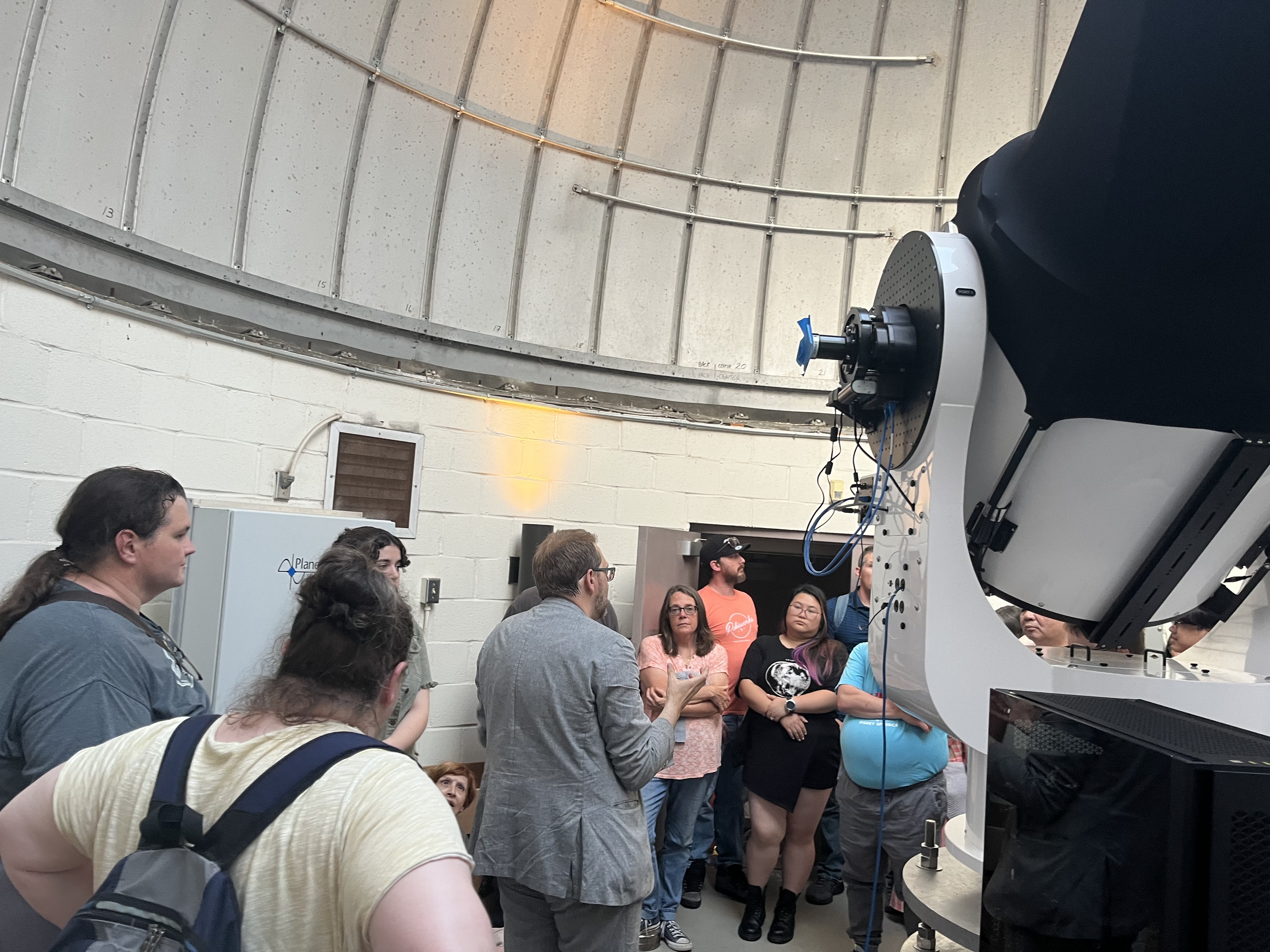 Open house visitors touring the telescope dome